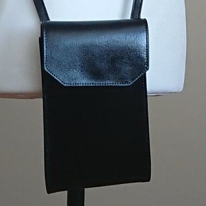 Clutch with a shoulder strap